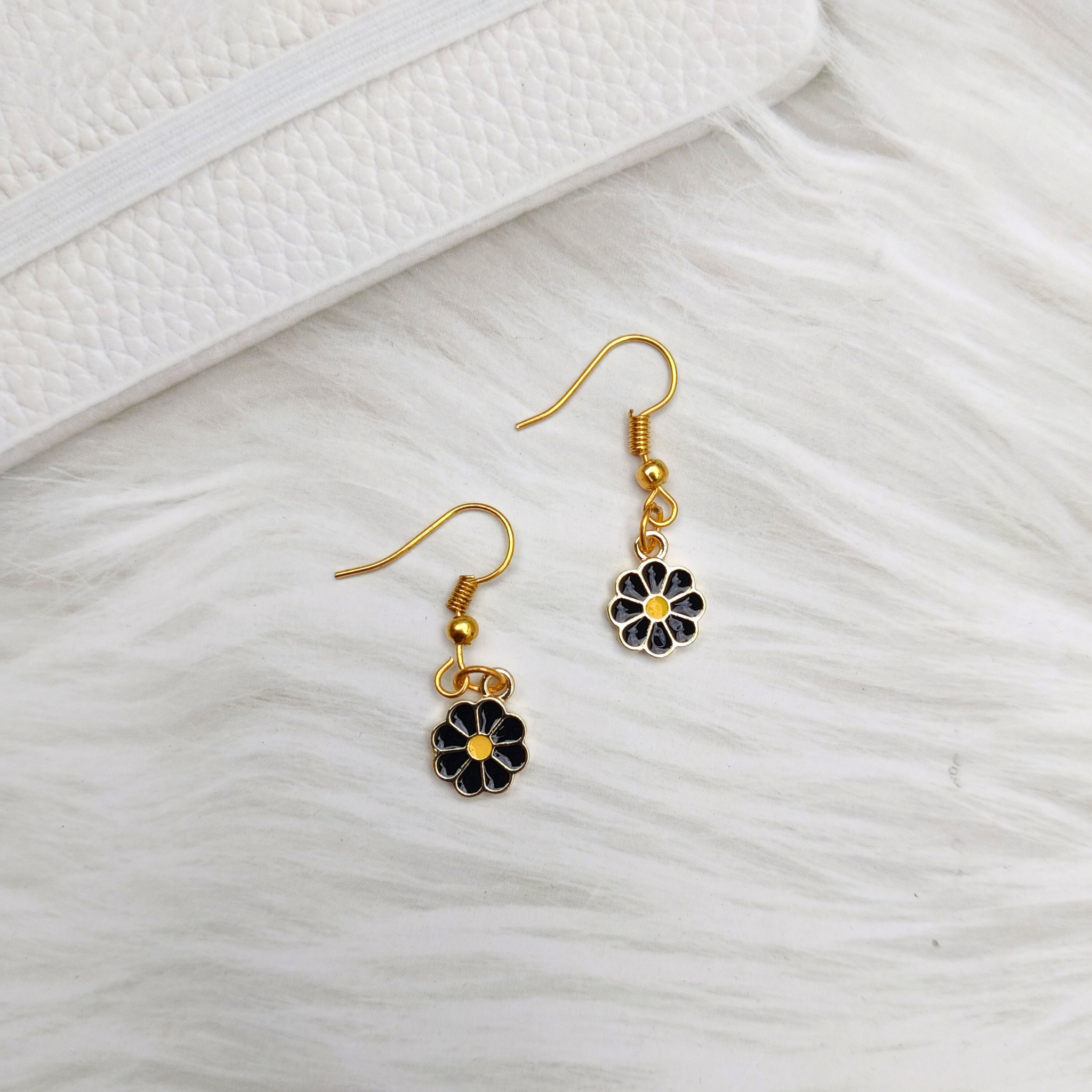 Buy Black Flower shape Earrings (black) at Amazon.in